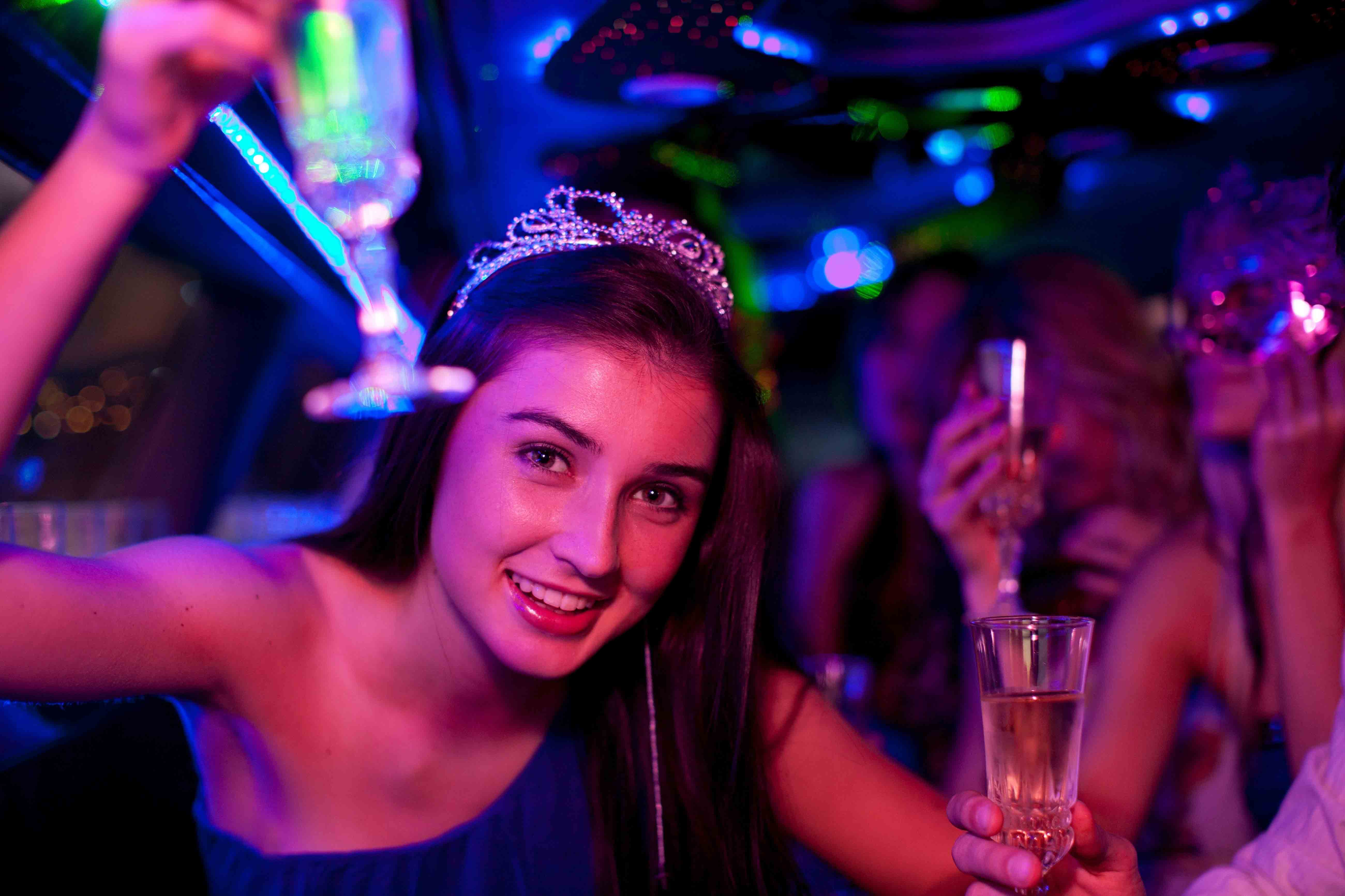 beautiful girl celebrating being prom queen with our prom limo service of Portland Oregon, limo service, limo service Portland Oregon