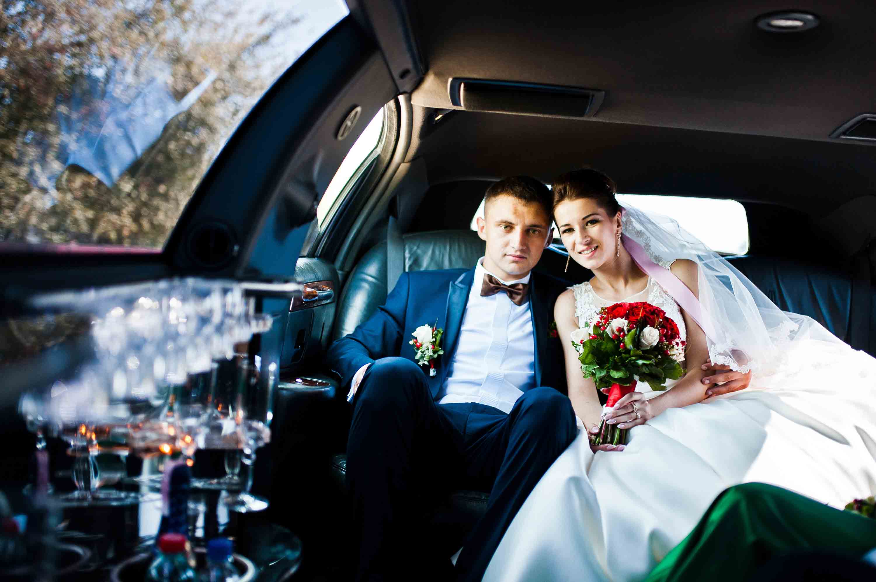 Man and women enjoying our wedding limo services in Portland Oregon, limo service, limo service Portland Oregon